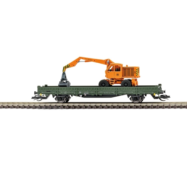 Busch 31516 TT Bauzugwagen mit Rungen Ks [3300] Beladen mit Bagger T-17